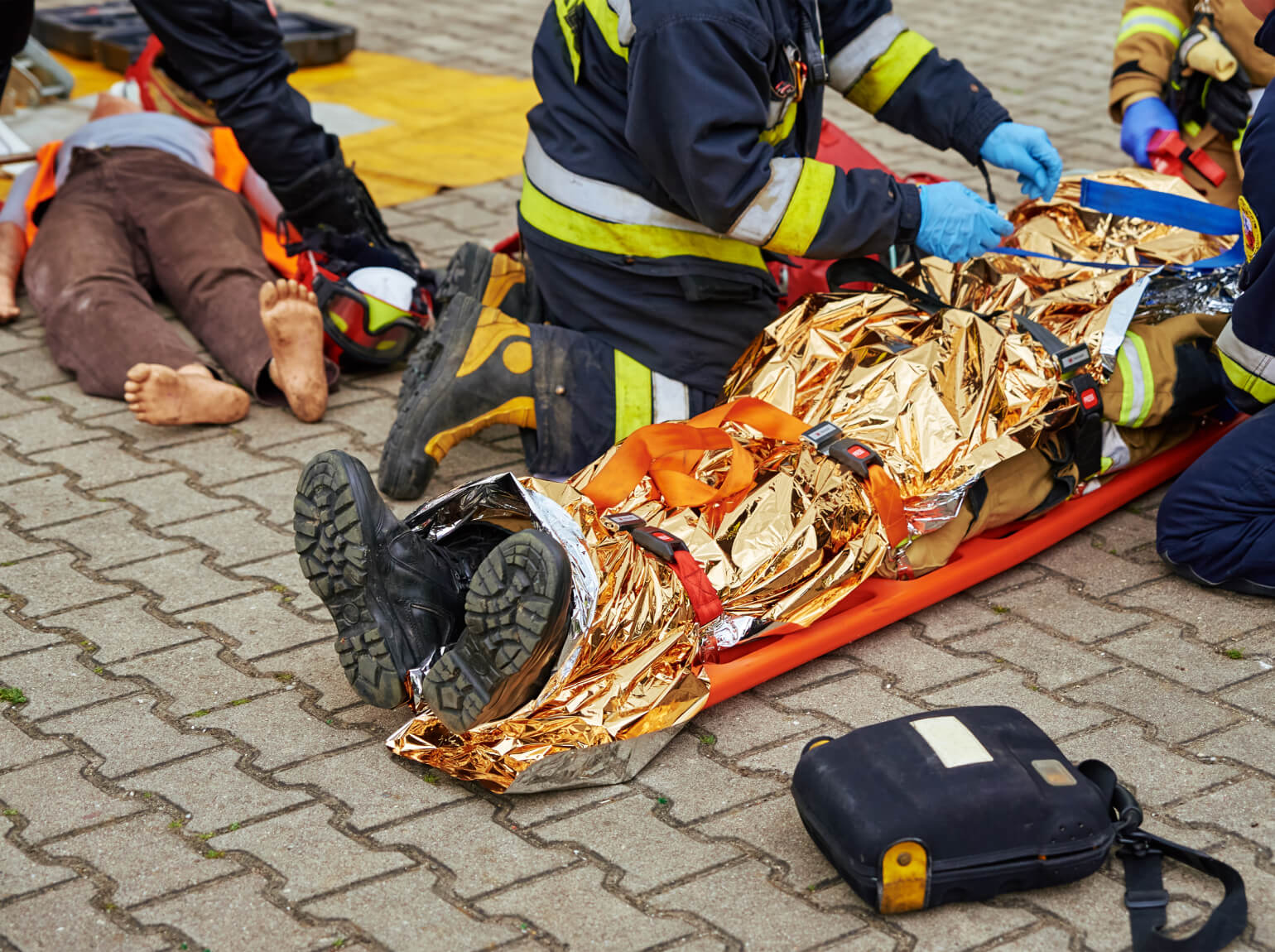 Rescuers provide first aid victim car accident person injured accident is lying